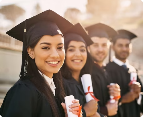 group diverse grads throwing caps up sky Italy 18